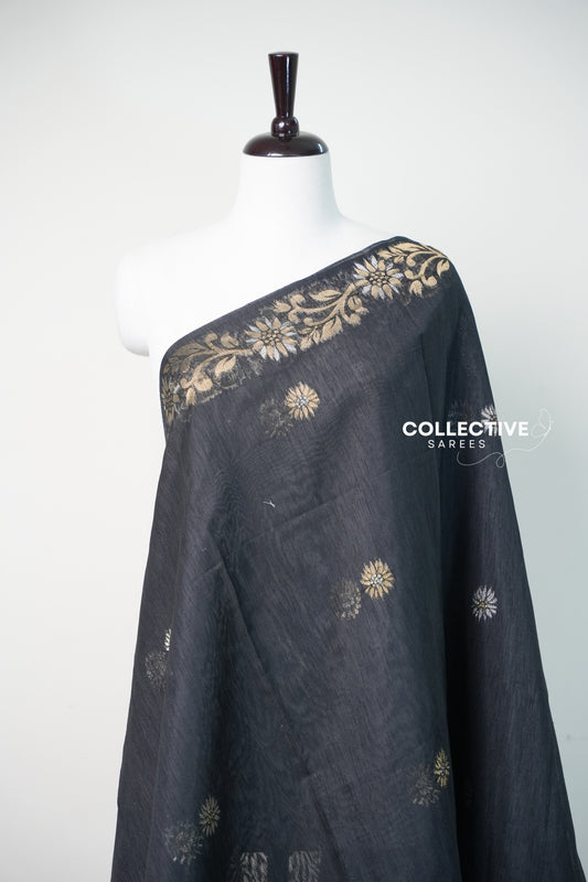 Black semi jute silk saree with gold and silver woven floral buttis