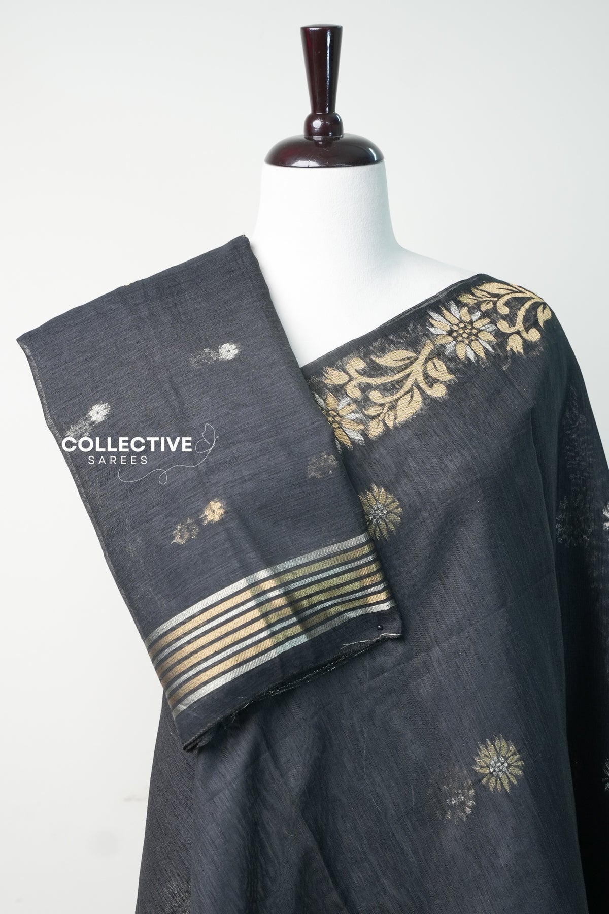Black semi jute silk saree pleats and striped blouse piece