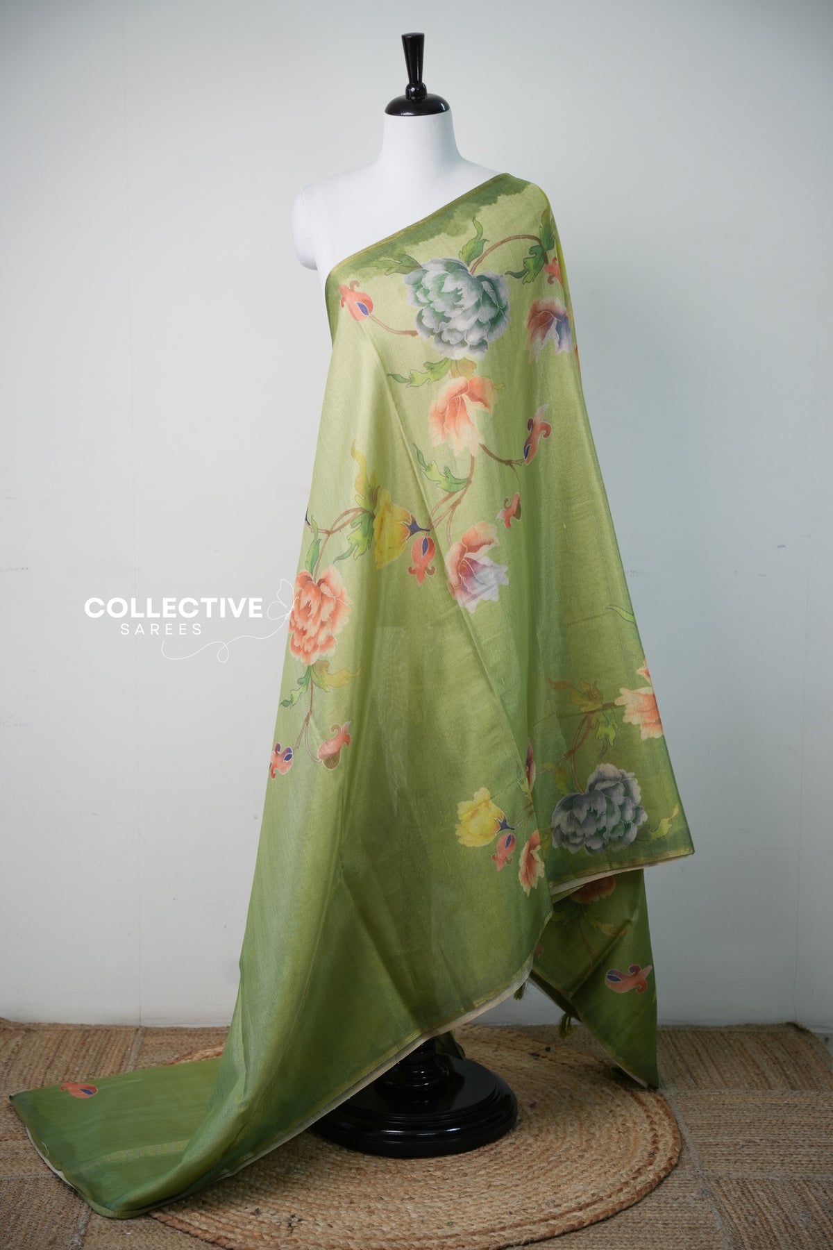 Apple green semi tissue saree with watercolour peony and rose print, full drape