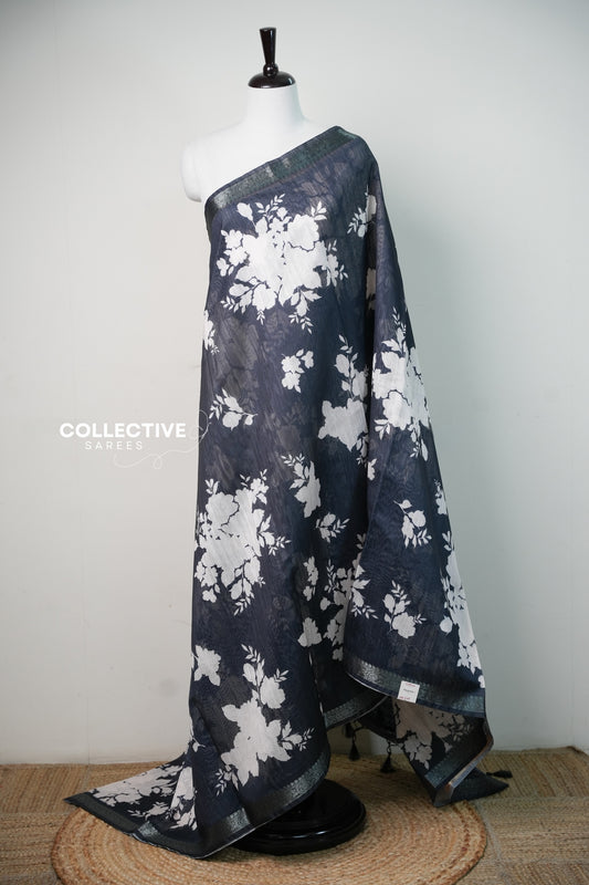 Black chanderi saree with white floral print and zari border, full drape