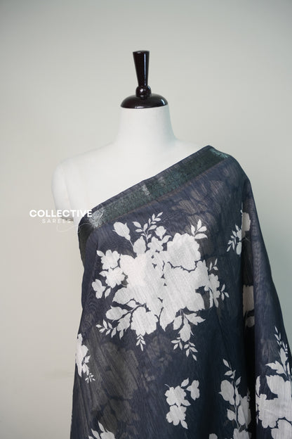 Black chanderi saree white floral print close-up with zari border