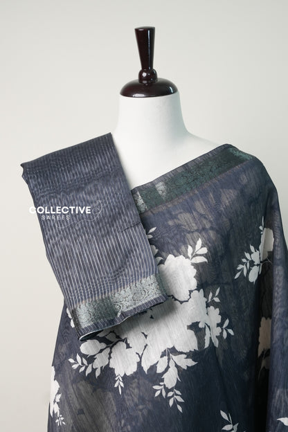 Black chanderi saree pleats with striped blouse piece and zari border