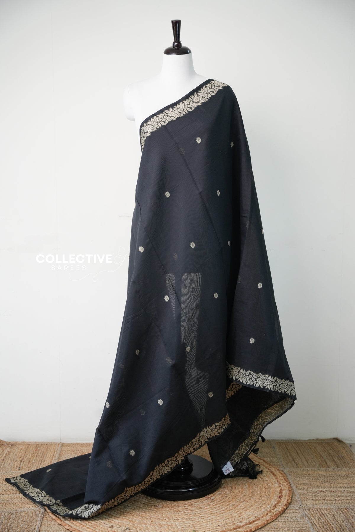 Black chanderi cotton saree with floral zari border and buttis, full drape