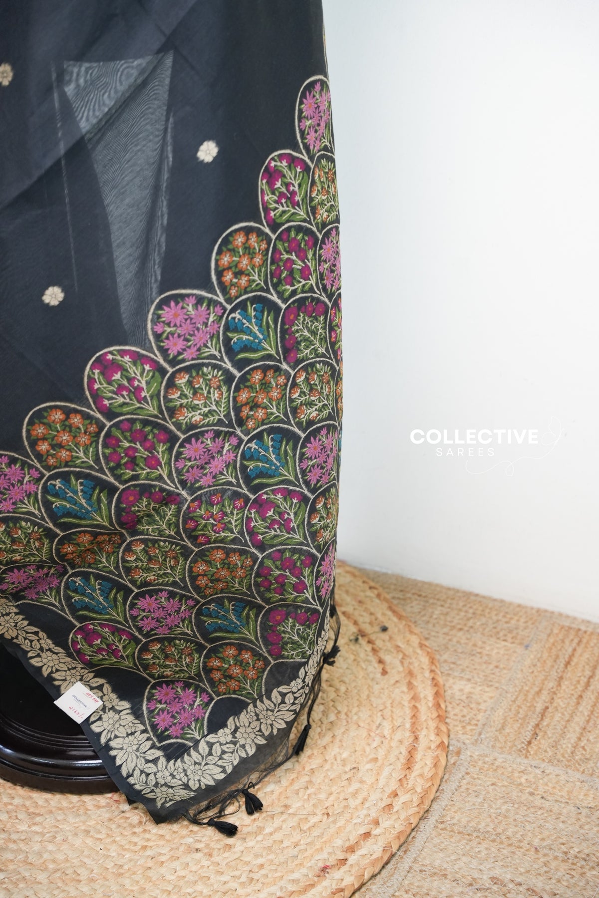 Black chanderi cotton saree pallu with multicolour scalloped floral weave and tassels