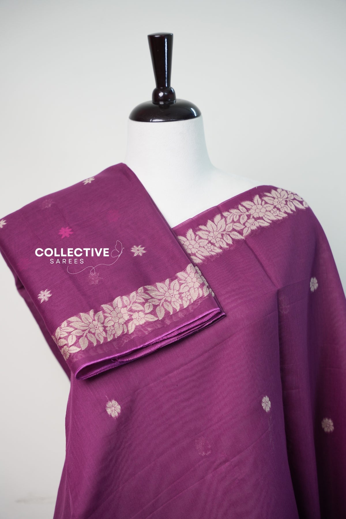Purple chanderi cotton saree pleats with matching blouse piece and floral border