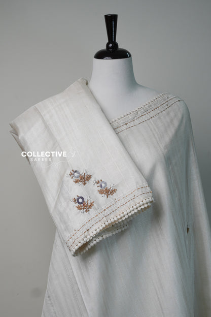 Beige dupion saree pleats and blouse piece with embroidered flowers