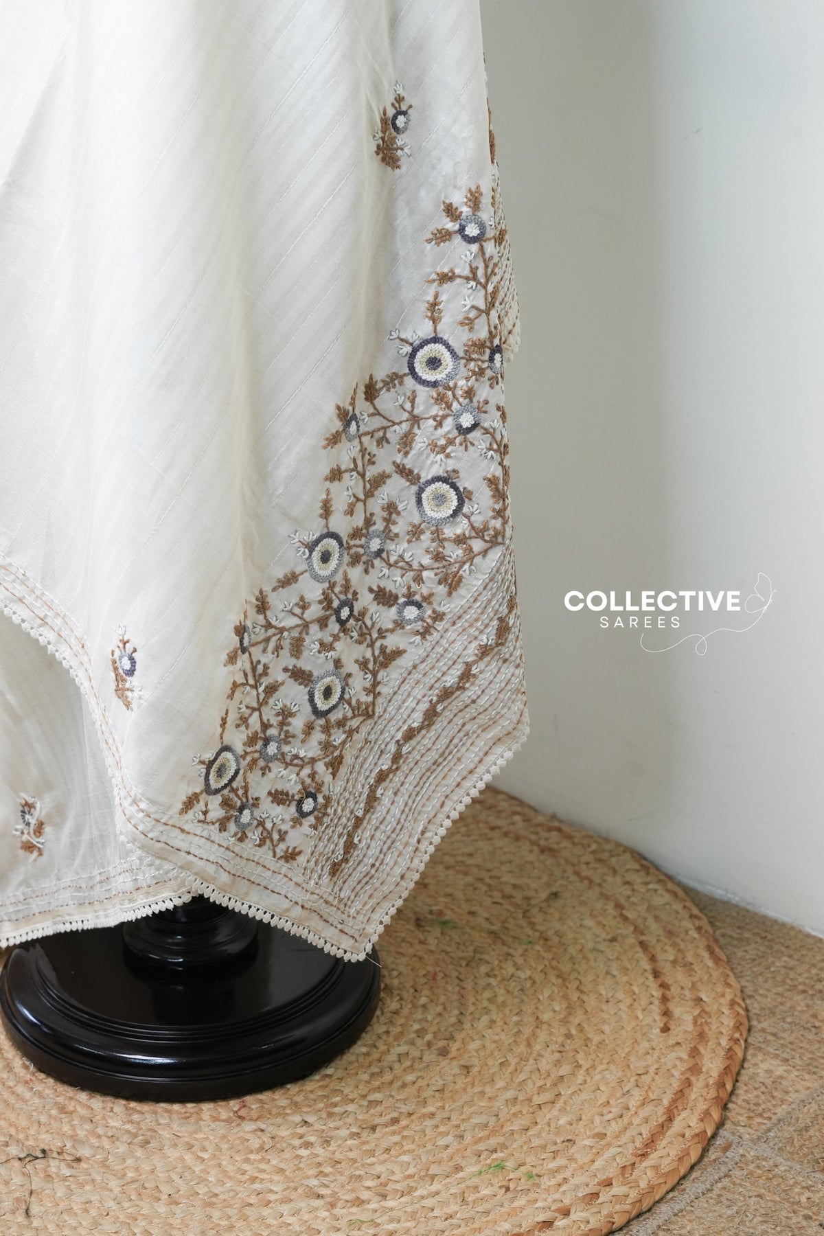 Beige dupion saree pallu with brown and grey floral vine embroidery