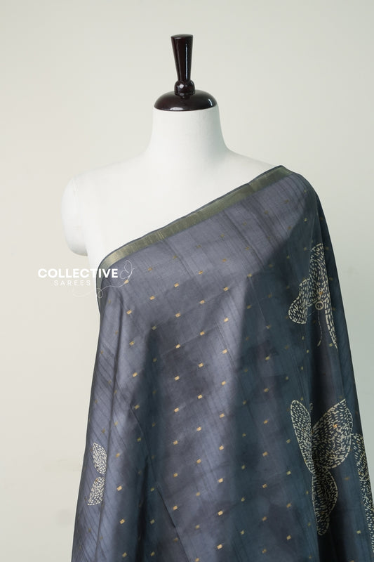 Grey dupion silk saree with gold zari buttis and butterfly motif close-up