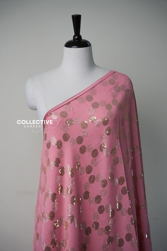 Blush pink georgette saree rose-gold and champagne sequin close-up