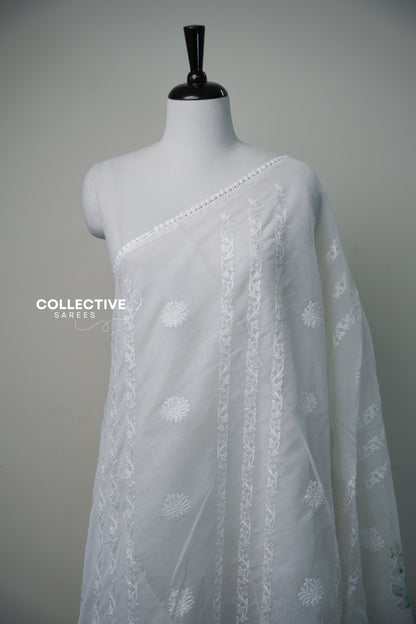 White organza saree with floral detailing and pastel floral pallu — view 1