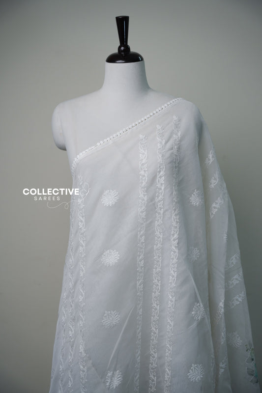 White organza saree with floral detailing and pastel floral pallu — view 1