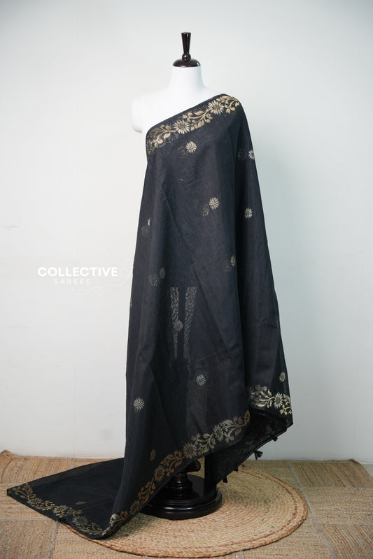 Black semi jute silk saree with gold floral border, full drape