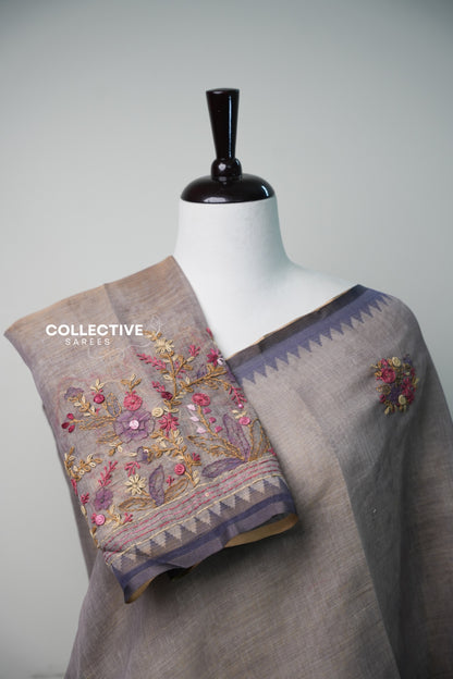 Light ash semi tissue saree pleats with embroidered blouse piece