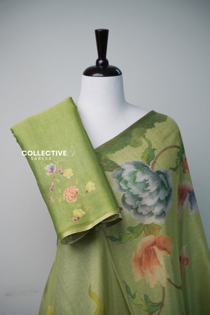 Apple green semi tissue saree with floral motif blouse piece