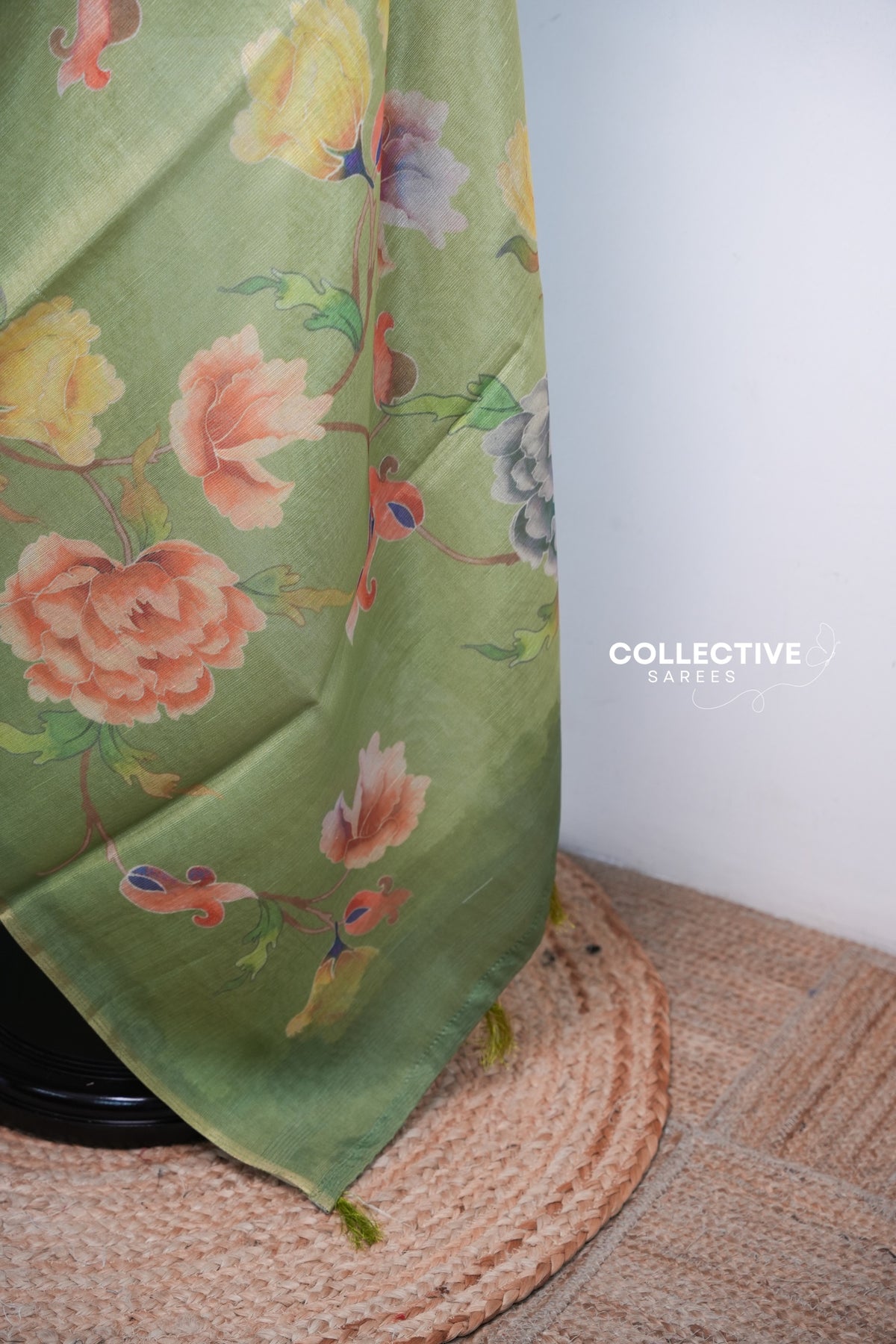Apple green semi tissue saree pallu with peach and yellow roses and tassels
