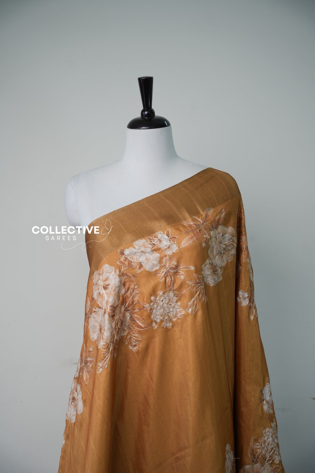 Mustard semi tussar saree zari-outlined rose print close-up
