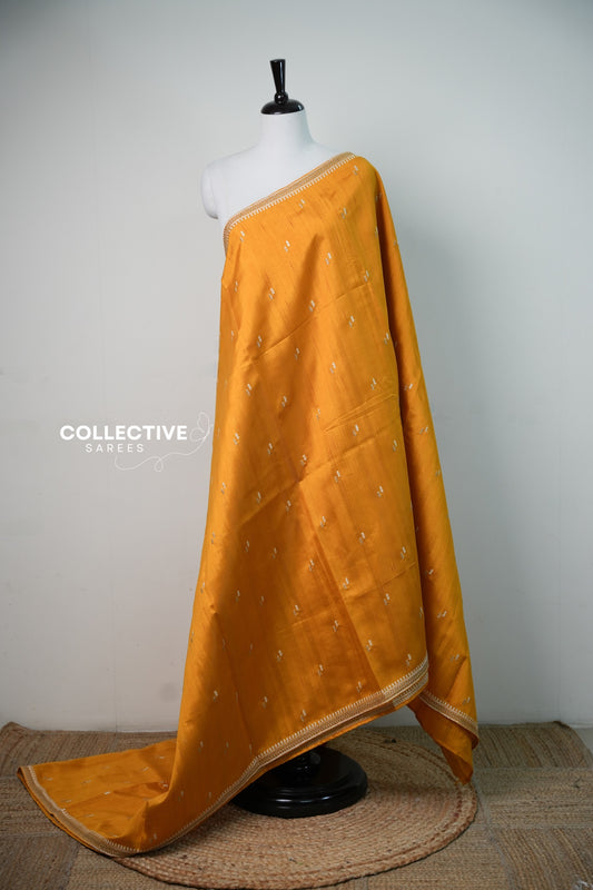 Mustard yellow semi tussar saree with ivory leaf embroidery, full drape